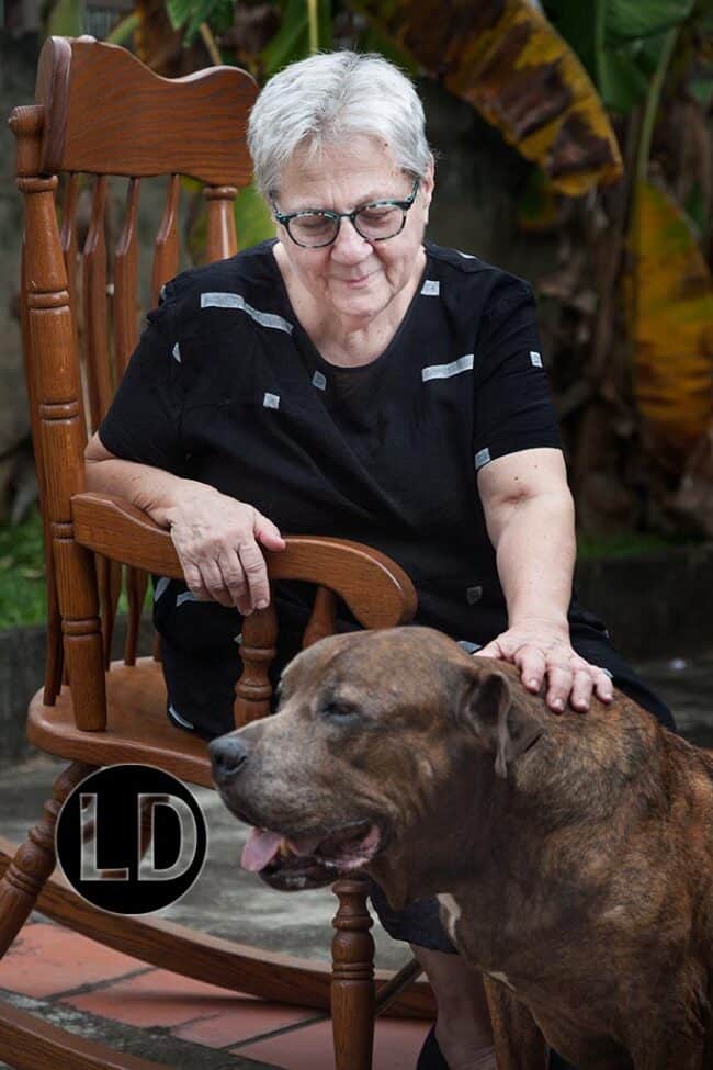 Debbie Jacob photographed with her dog Rambo at her Maraval home